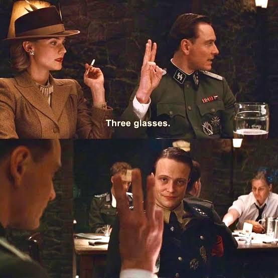 two frames from the three-fingers scene in inglourious basterds.